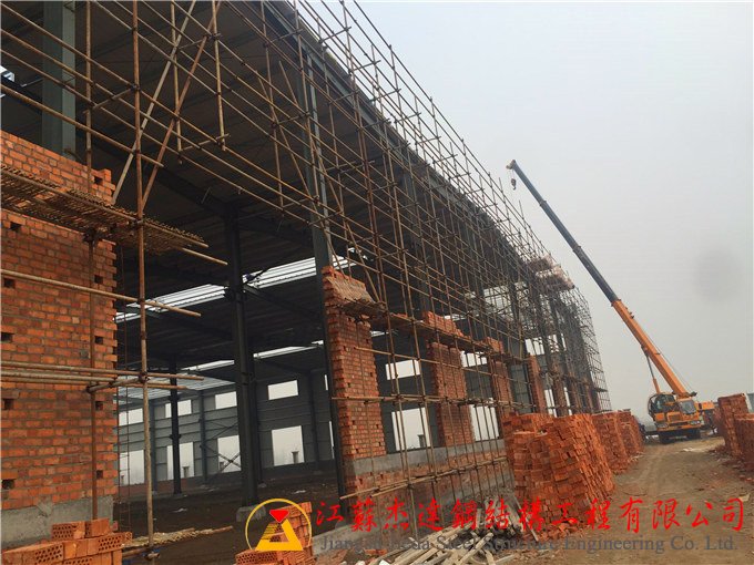 鹽城沙金石油連跨全鋼結(jié)構(gòu)施工近況磚混結(jié)構(gòu)墻體施工 鹽城沙金石油連跨全鋼結(jié)構(gòu)施工近況磚混結(jié)構(gòu)墻體施工