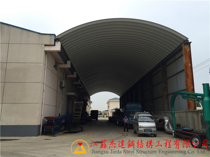 過道式拱形屋頂倉間罩棚江蘇杰達(dá)鋼結(jié)構(gòu)過道式拱形屋頂