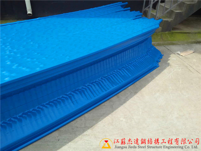 揚(yáng)州市邗江區(qū)公道糧庫倉間罩棚工程江蘇揚(yáng)州倉間罩棚拱形屋頂出板