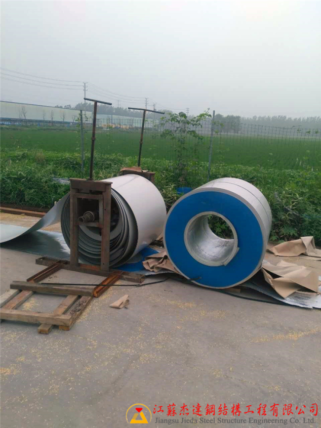 江蘇鹽城便倉糧庫倉間罩棚施工拱形屋頂糧庫用彩涂卷